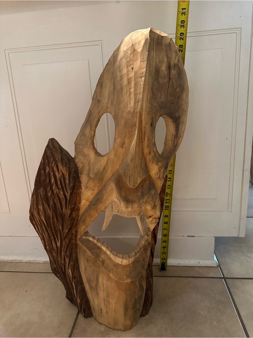 Hand-Carved Wooden Mask Sculpture in Natural Brown